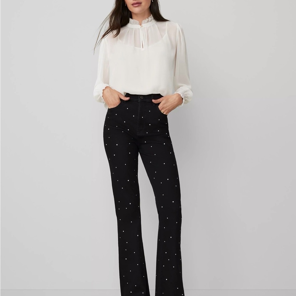 Ann Taylor- the embellished flare jeans. Worn once